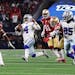 Dak Prescott (4) of the Dallas Cowboys scrambles with the ball on the last play of the game against the San Francisco 49ers during the fourth quarter 