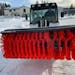 Jared Olafson used a machine donated by Ironhide Equipment to clear the skate path.