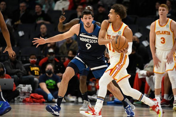 Hawks guard Trae Young (guarded by the Timberwolves’ Leandro Bolmaro), who is averaging 27.7 points per game this season, scored 29 points in a 121-