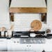 This kitchen by Studio McGee features standard subway tile with a darker grout.