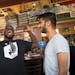 Soccer fans Abraham Opoti and Nachiket Karnik got riled up at Nomad World Pub (now Part Wolf) before a Minnesota United FC game in 2015.