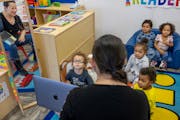 Carolina Saldaña sang with toddlers at the Rainbow Child Development Center in St. Paul earlier this month. The center is grappling with staffing sho