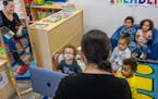 Carolina Saldaña sang with toddlers at the Rainbow Child Development Center in St. Paul earlier this month. The center is grappling with staffing sho