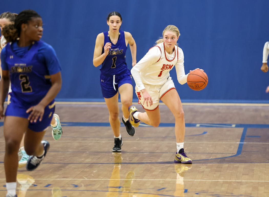 Benilde-St. Margaret’s sophomore Olivia Olson, shown here playing Holy Angels, has already reached 1,000 career points.