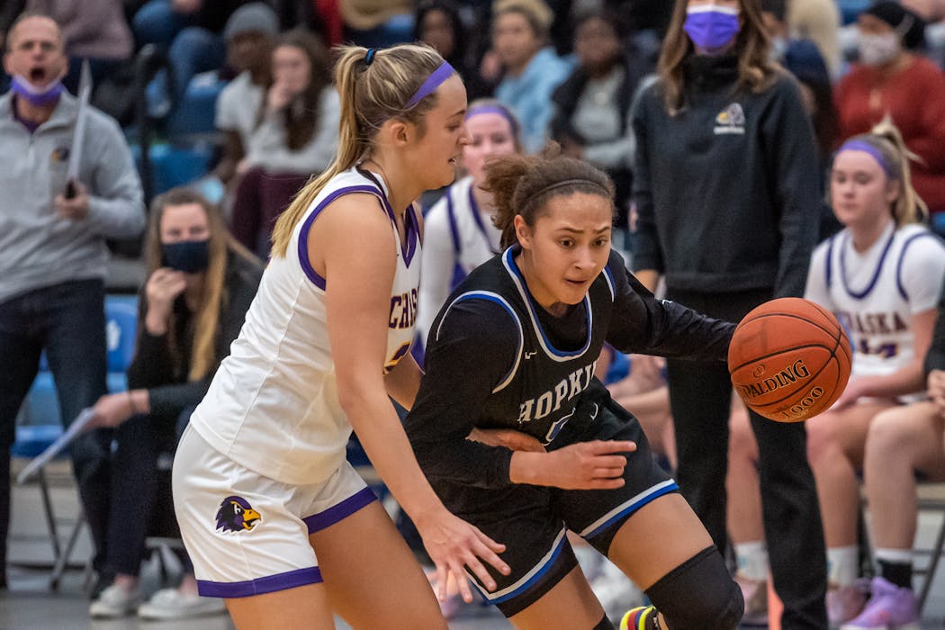 Amaya Battle worked her way past a Chaska defender during a December game.