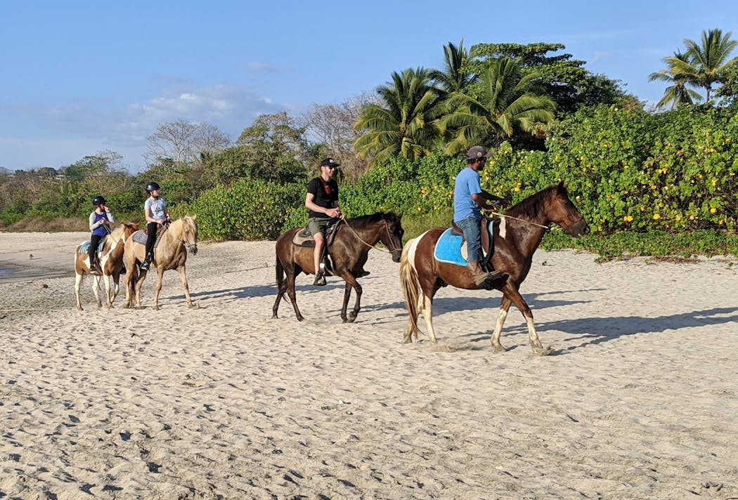 Horseback riding on Playa Pelada, one of the main beaches in Nosara.