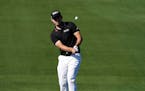 Patrick Cantlay hits to the second hole during the first round of the American Express golf tournament 