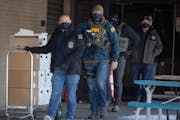 FBI agents execute search warrant at Twin Cities nonprofit Feeding our Future on Jan. 20. 