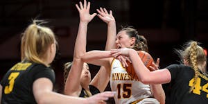 Indicative of Thursday evening, Gophers forward Kayla Mershon ran into a host of Iowa Hawkeyes on her way to the hoop.