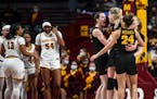 Iowa teammates celebrate with forward Monika Czinano (25) after she was fouled for an and-one opporunity during the second half of an NCAA women’s b