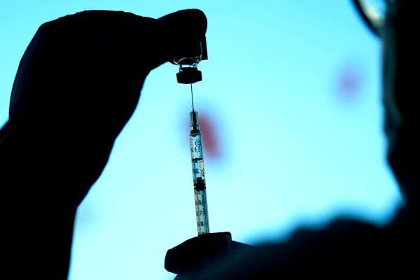 A dose of a Pfizer COVID-19 vaccine was prepared at Lurie Children’s hospital, Nov. 5, 2021, in Chicago.