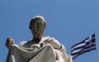 A marble statue of ancient Greek philosopher Plato in Athens. A letter writer argues that important foundations of Western civilization are being shor