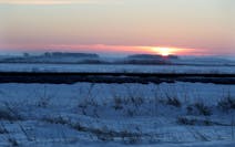 The windswept prairie near Noyes, Minn., may seem a strange place to cross the U.S.-Canada border. But wintertime has advantages for those seeking to 