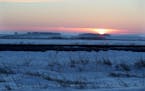 The windswept prairie near Noyes, Minn., may seem a strange place to cross the U.S.-Canada border. But wintertime has advantages for those seeking to 
