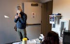 Andrew Leshovsky took a saliva PCR test Thursday at the Ritz Theater in Minneapolis. Leshovsky is director of marketing for Theater Latté Da, which 