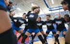 Hopkins guard Jasmine Dupree (11) dances in the middle of the girl’s basketball team huddle before playing no.1 ranked Sidwell Friends in the Girl�