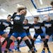 Hopkins guard Jasmine Dupree (11) dances in the middle of the girl’s basketball team huddle before playing no.1 ranked Sidwell Friends in the Girl�