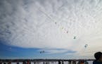 The kite sewn together by Richard Masak from St. Paul makes its way up toward the sky during the Lake Harriet Winter Kite Festival, Saturday, Jan. 22,