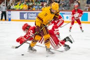 Gophers forward Taylor Heise, in an earlier game against Wisconsin above, had two goals Saturday in Minnesota’s 5-3 win over Ohio State.