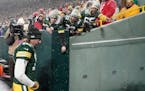 Green Bay Packers’ Aaron Rodgers leaves the field after the Packers lost to the 49ers.