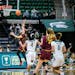 Gophers standout Sara Scalia went in for a layup at Michigan State on Sunday. Scalia scored 31 points in the 74-71 loss to the Spartans.