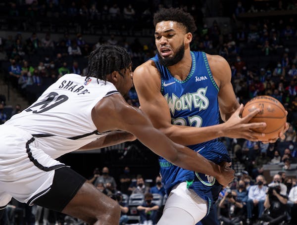Towns' finish pushes Wolves over Nets; Edwards has injury scare