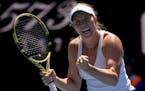 Danielle Collins of the U.S. reacted after winning a point against Elise Mertens of Belgium during their fourth-round match at the Australian Open on 