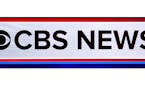 FILE - The CBS News Logo appears on stage at a Democratic presidential primary debate on Feb. 25, 2020, in Charleston, S.C.. CBS News says it is retoo