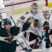 Kevin Fiala scored with the goalie pulled on Saturday as the Wild tied the Blackhawks, then won in overtime