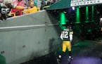 Green Bay Packers' Aaron Rodgers leaves the field after an NFC divisional playoff NFL football game against the San Francisco 49ers Saturday, Jan. 22,