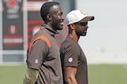 Kwesi Adofo-Mensah, left, watched a Cleveland Browns practice last year with general manager Andrew Barry.