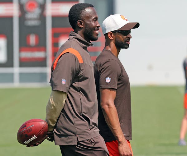 Kwesi Adofo-Mensah, left, with Browns General Manager Andrew Berry at the team’s training camp in August.