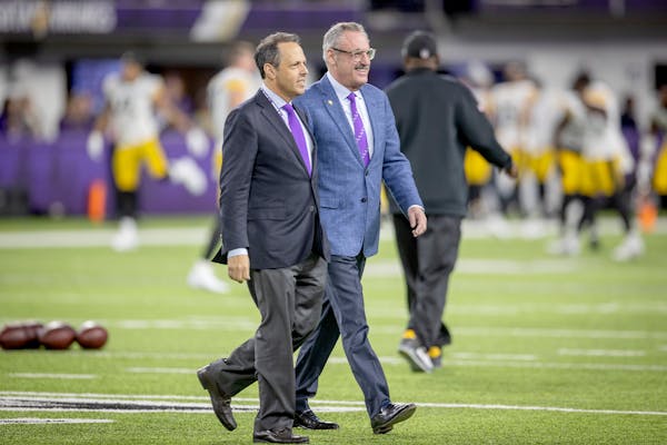 Vikings co-owner Mark Wilf, at left with brother Zygi, said this month the new GM will “have input” in the coaching hire. 
