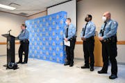 Minneapolis Police Interim Chief Amelia Huffman speaks to to the media as she introducers her new appointees, from left, Deputy Chief of Professional 