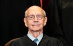 Associate Justice Stephen Breyer sits during a group photo of the Justices at the Supreme Court in Washington, D.C., on April 23, 2021. 
