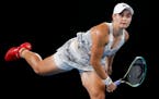 Ash Barty of Australia serves to Madison Keys of the U.S. during their semifinal match at the Australian Open tennis championships in Melbourne, Austr