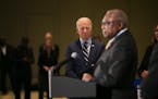 Joe Biden, then a presidential hopeful, listened to Rep. James Clyburn, D-S.C.. in February 2020 in Charleston. The promise to put a Black woman on th