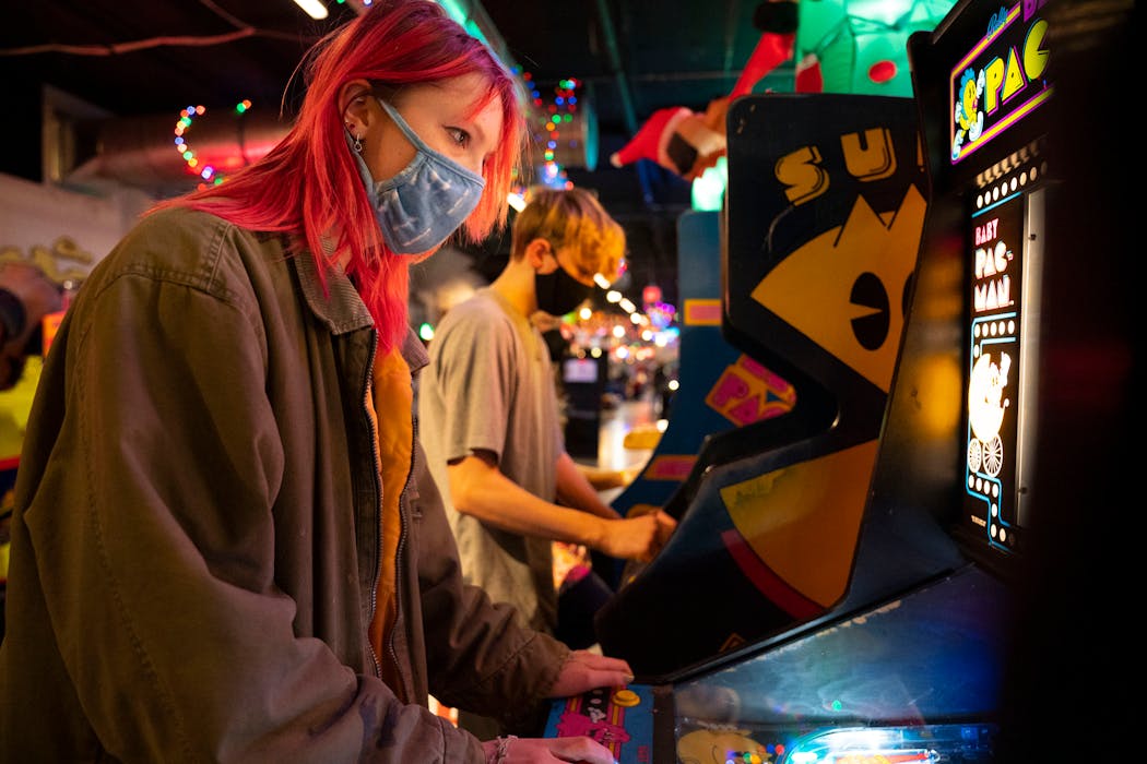 Rowen Brunett, 15, played Ms. Pac Man while her brother, Finn, 13, played Super Pac Man at Can Can Wonderland in St. Paul earlier this month.