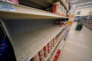 Once-crowded supermarket pasta shelves now sit empty.