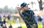 Jon Rahm hits his tee shot on the eighth hole of the North Course during the second round of the Farmers Insurance Open