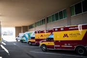 Ambulances lined up outside the emergency department at United Hospital in St. Paul.