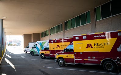 Ambulances lined up outside the Emergency Department at United Hospital in St. Paul.