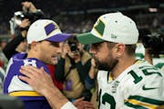 Kirk Cousins greeted Aaron Rodgers after a game between the Vikings and Packers.