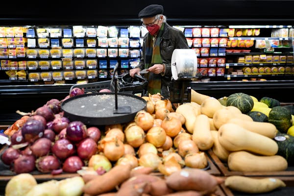 Retired school teacher Alan Briesemeister of Delano checked his list while shopping for groceries Jan. 27 at Coborn’s in Delano. “I don’t like i