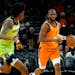 Phoenix Suns guard Chris Paul moves the ball up court as Timberwolves forward Jaden McDaniels defends during the second half Friday.