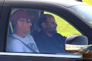 Brett Favre, left, and Vikings coach Brad Childress drove away from the St. Paul airport on Aug. 18, 2009.