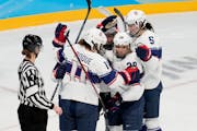 Amanda Kessel (28) is congratulated after scoring a goal during Thursday’s 5-2 victory over Finland.