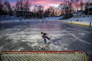 Chip Dulin,7, moves in on an open net on Bill Traff’s Olympic size rink in Long Lake, Minn., on Tuesday, Jan. 11, 2022. Minnesota is the country’s