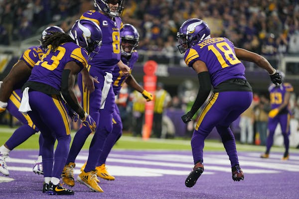 Vikings receiver Justin Jefferson (18) celebrated a touchdown against the Steelers on Dec. 9.