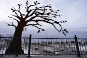 Stylized oak trees, fashioned from steel, act as greeters on the new Dale Street bridge over I-94 in St. Paul. 